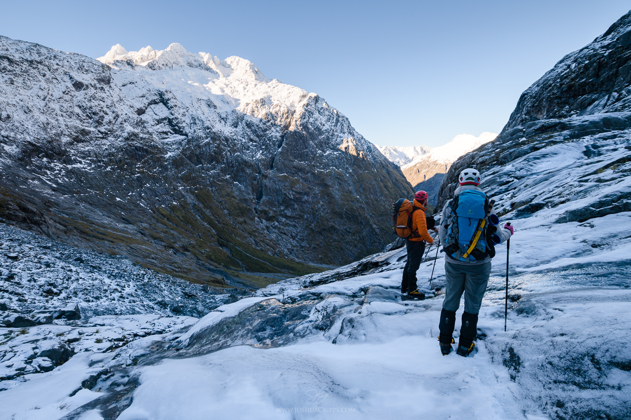 Beginning the climb up the slabs. Any slip here would be life-threatening.