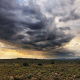 Thunder clouds and god beams in the Great Karoo Desert, South Africa