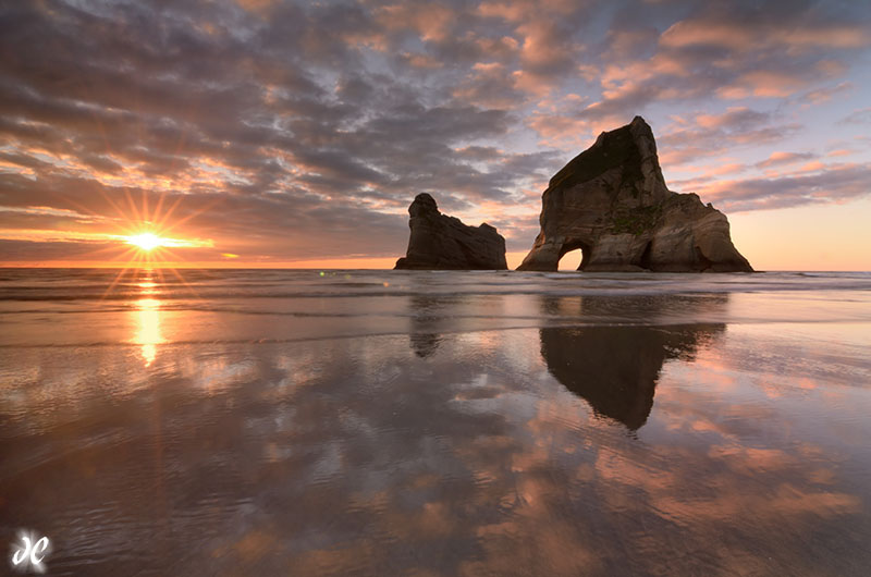 Wharariki Beach sunset, South Island, New Zealand