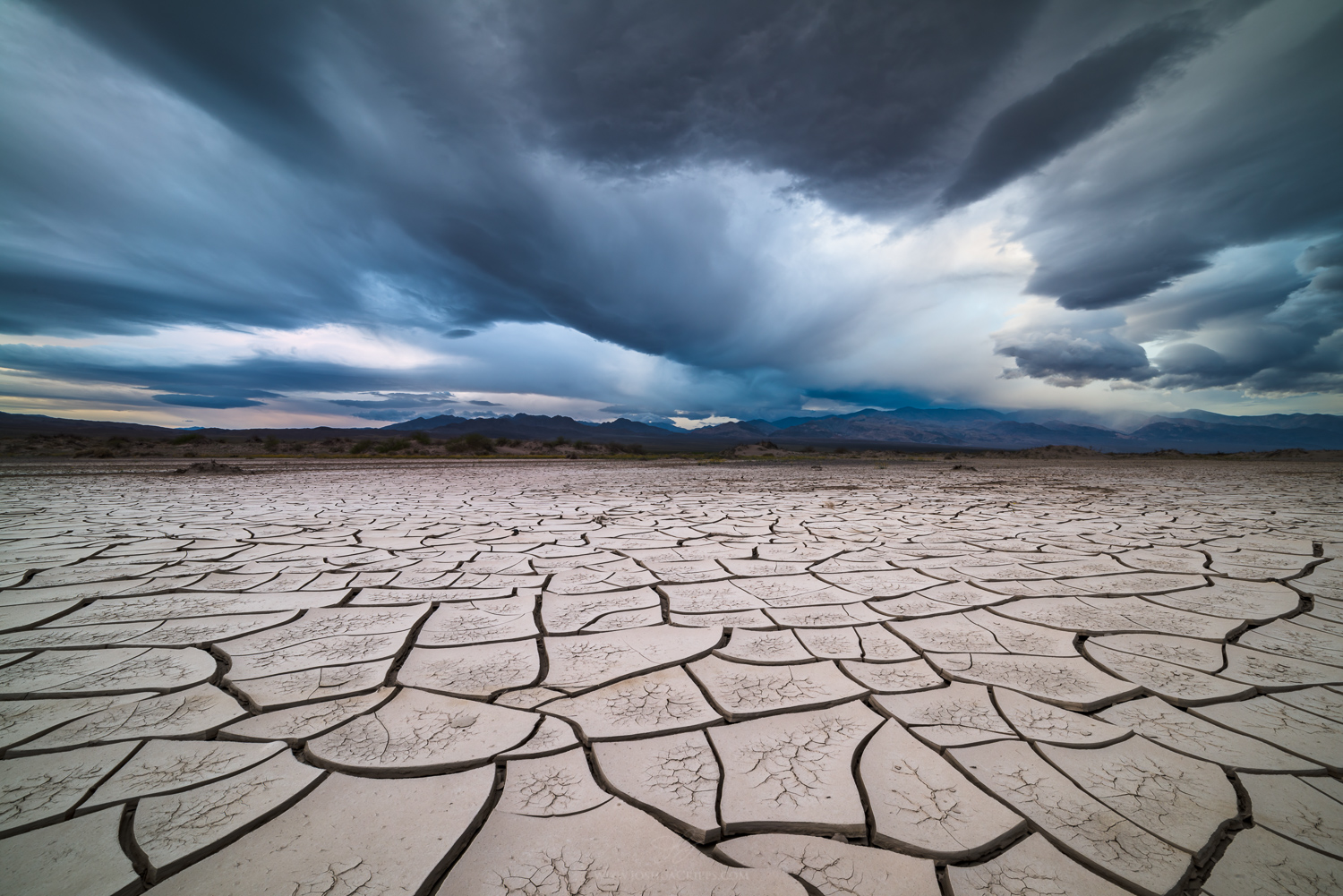 Death-Valley-mud-cracks-stormy-sunset